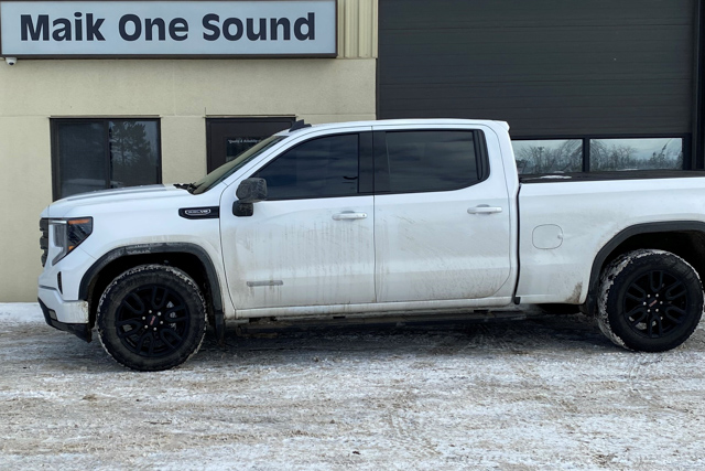 2025 GMC Sierra with professional window tint in North Bay